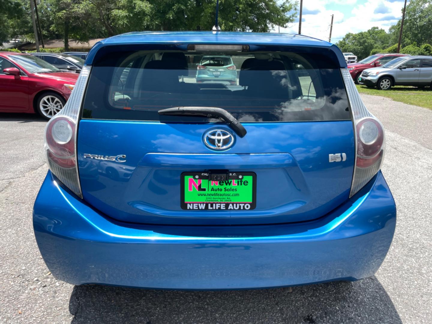 2013 BLUE TOYOTA PRIUS C ONE (JTDKDTB34D1) with an 1.5L engine, Continuously Variable transmission, located at 5103 Dorchester Rd., Charleston, SC, 29418-5607, (843) 767-1122, 36.245171, -115.228050 - Photo#5